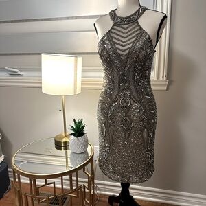 Beaded evening dress with mesh accents